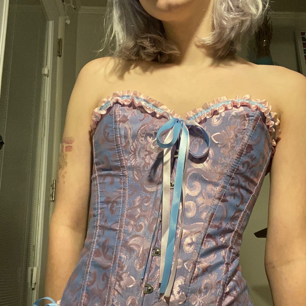 baby blue and pink corset with ribbons